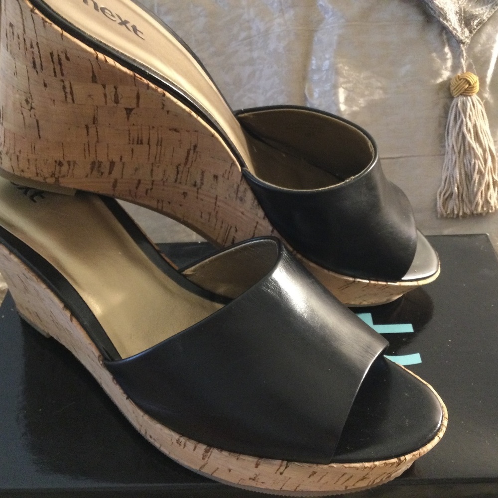 New with  original box black leather sandals